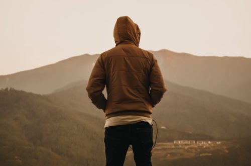 person wearing brown hoodie